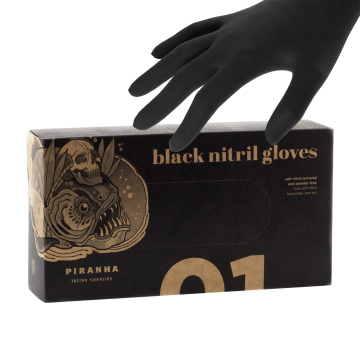 Box of 100 Piranha black nitrile gloves with textured surface and tattoo supplies branding.