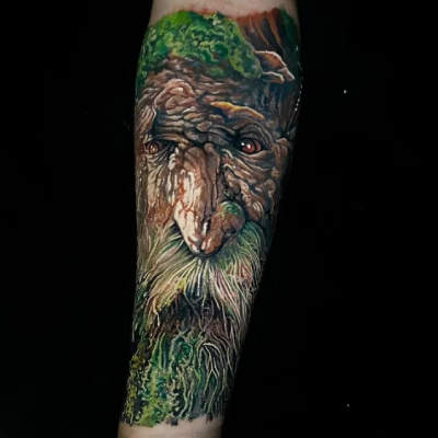 A colour realism tattoo by Miro Pridal of Treebeard the Ent in extreme close up.